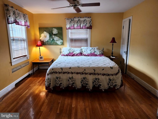 bedroom with ceiling fan and hardwood / wood-style flooring