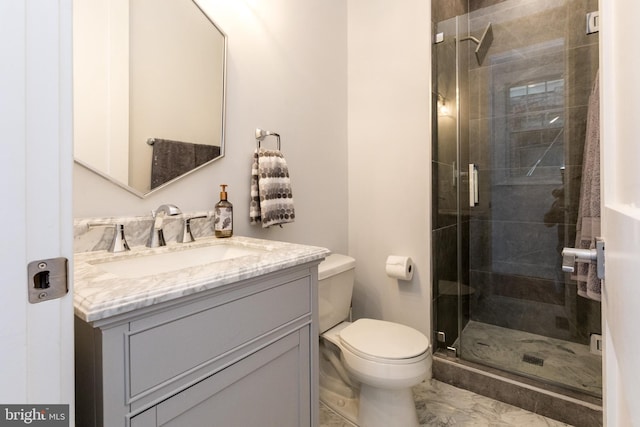 bathroom with an enclosed shower, toilet, vanity, and tile flooring