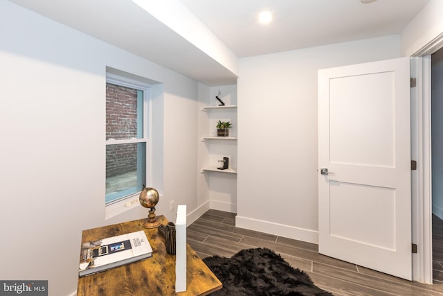 interior space with dark wood-type flooring