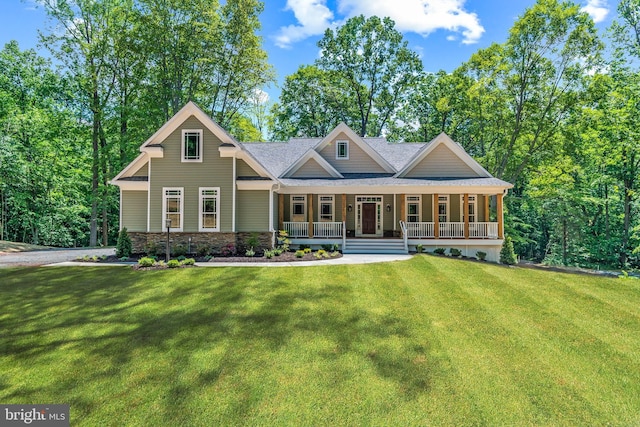 craftsman house with a porch and a front lawn