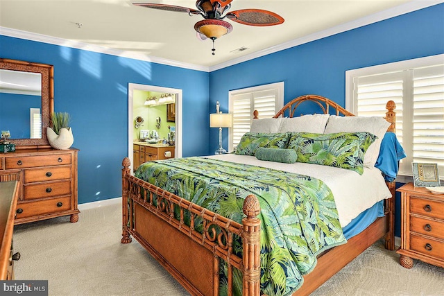 bedroom featuring connected bathroom, light colored carpet, ceiling fan, and multiple windows