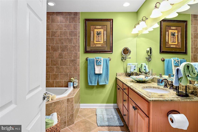 bathroom featuring a relaxing tiled bath, tile flooring, and dual vanity