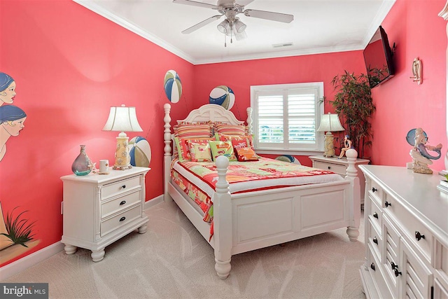 carpeted bedroom with ceiling fan and ornamental molding