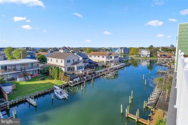 view of water feature with a dock