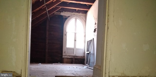 unfinished attic with a healthy amount of sunlight