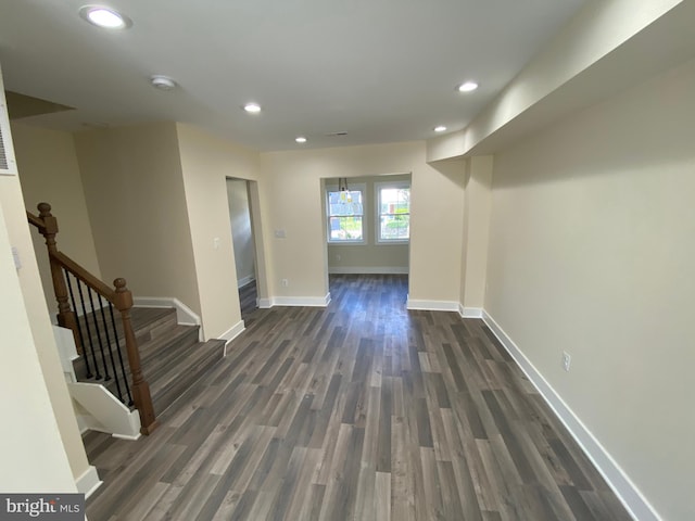 hall featuring dark wood-type flooring