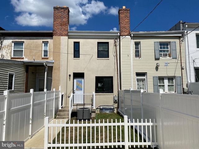 view of property featuring central AC