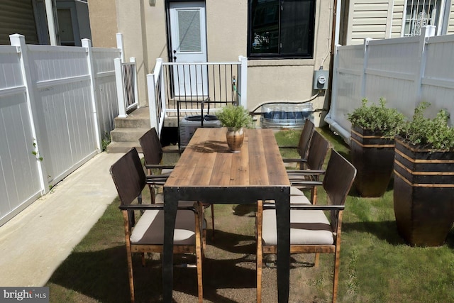 view of patio / terrace featuring central AC unit