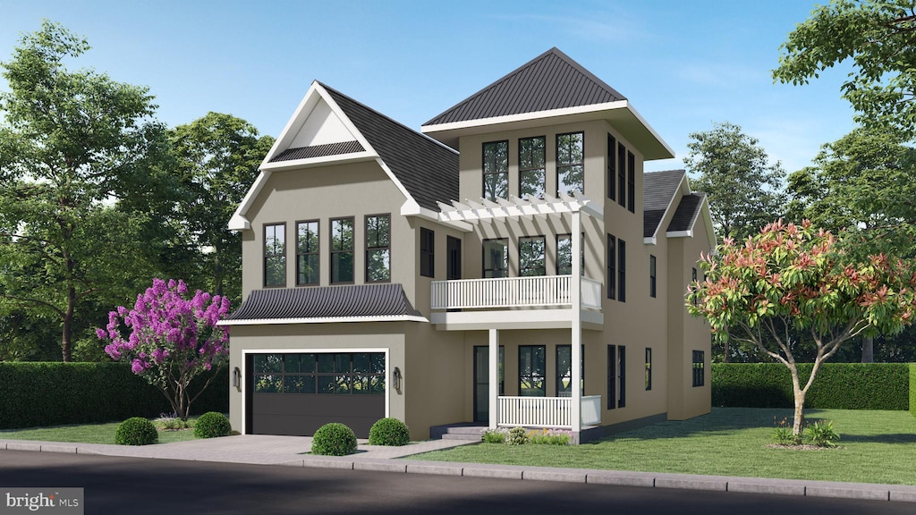 view of front of home with a front yard, a balcony, and a garage