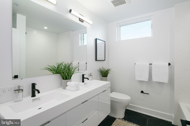 full bathroom with toilet, double vanity, shower / tub combination, and tile flooring