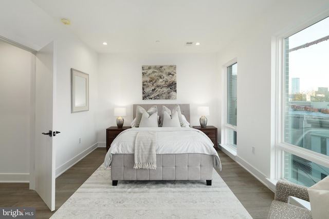 bedroom featuring dark wood-type flooring