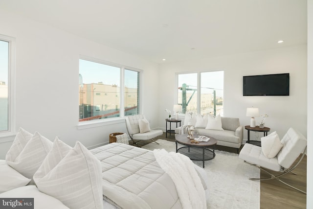 interior space with plenty of natural light and light hardwood / wood-style floors