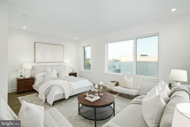 bedroom with light hardwood / wood-style flooring