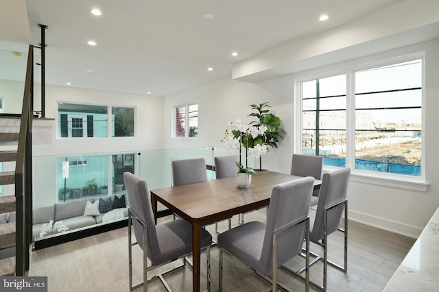 dining room with light hardwood / wood-style floors