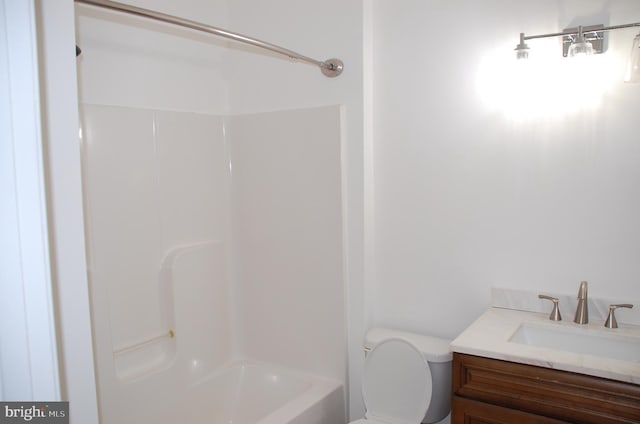 full bathroom featuring toilet, vanity, and shower / tub combination