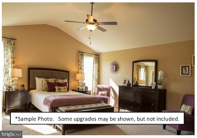 bedroom featuring ceiling fan, vaulted ceiling, and carpet