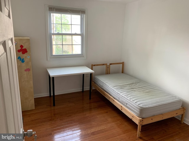 bedroom featuring hardwood / wood-style flooring