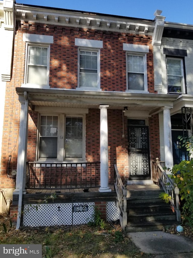 802 K St NE, Washington, DC 20002 - townhome / multi-family property with brick siding and covered porch
