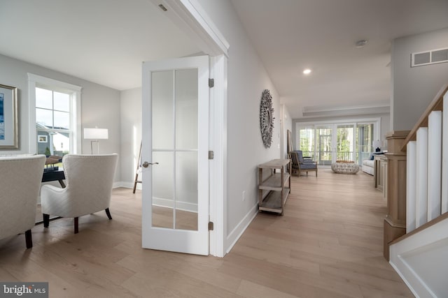 hall featuring light wood-type flooring