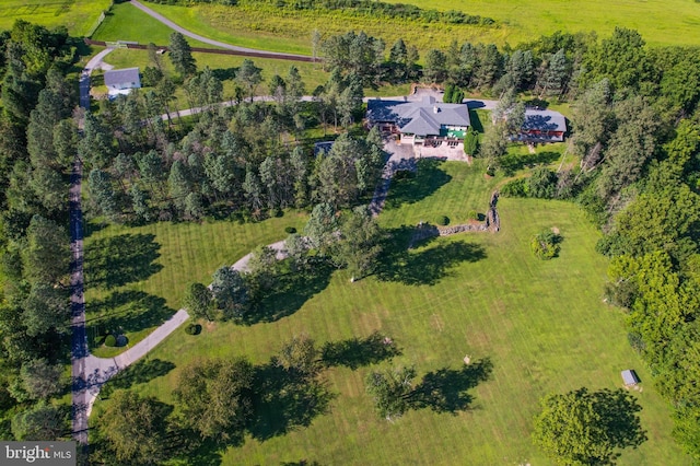 birds eye view of property featuring a rural view