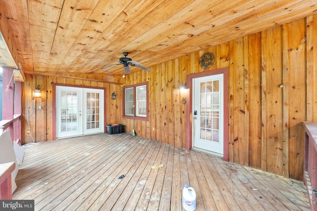 wooden terrace featuring ceiling fan and french doors