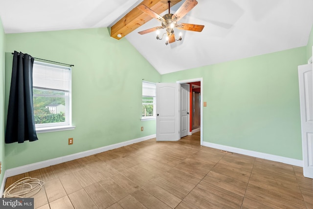 unfurnished bedroom with lofted ceiling with beams and ceiling fan