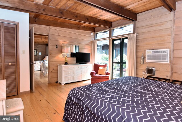 bedroom with wooden walls, wood ceiling, light wood-type flooring, and beamed ceiling