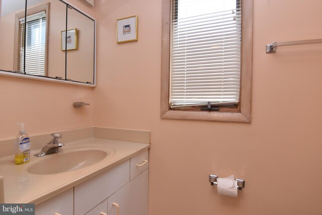 bathroom featuring large vanity