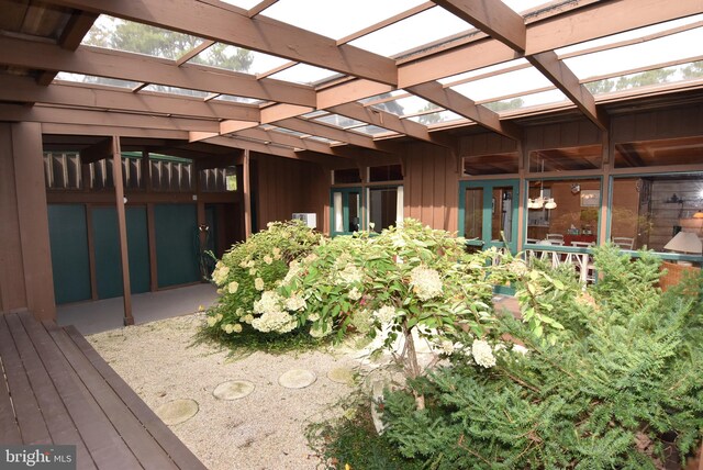 interior space featuring wooden walls