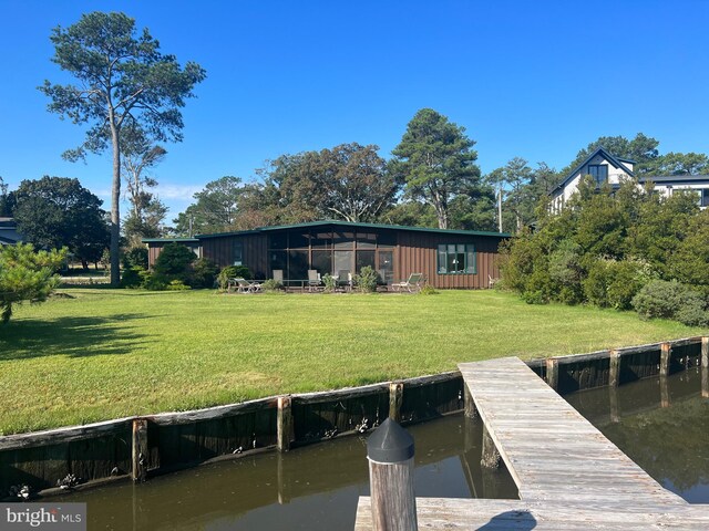 dock area with a lawn