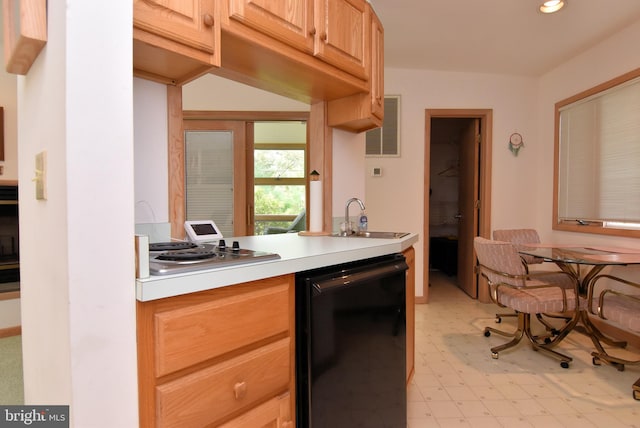 kitchen with light tile flooring, black dishwasher, gas cooktop, light brown cabinetry, and sink