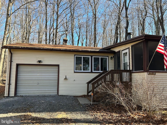 single story home featuring a garage