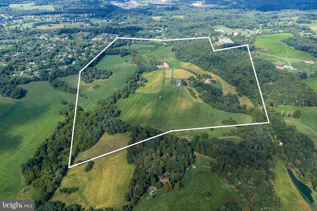 birds eye view of property featuring a rural view