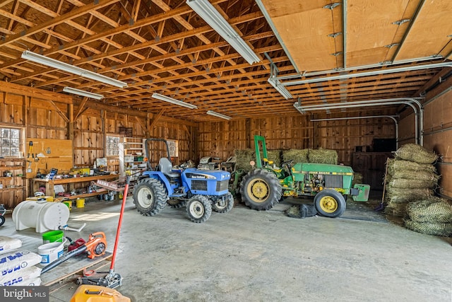 garage with a workshop area