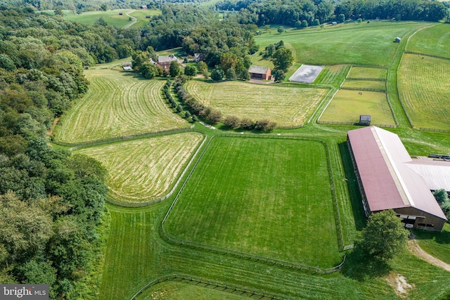 birds eye view of property featuring a rural view