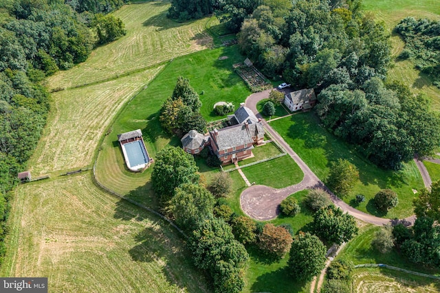 birds eye view of property featuring a rural view