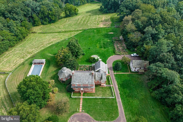 birds eye view of property featuring a rural view