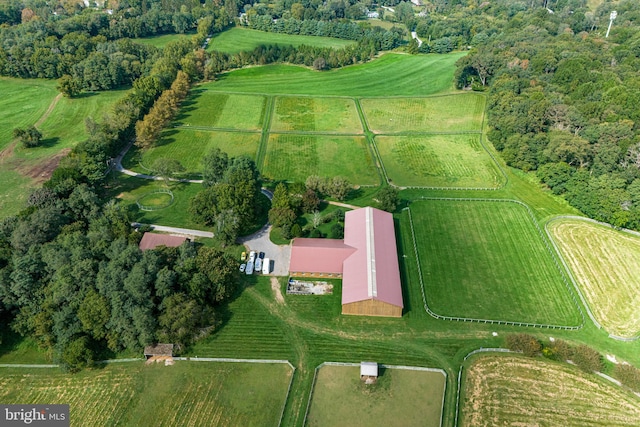 birds eye view of property featuring a rural view