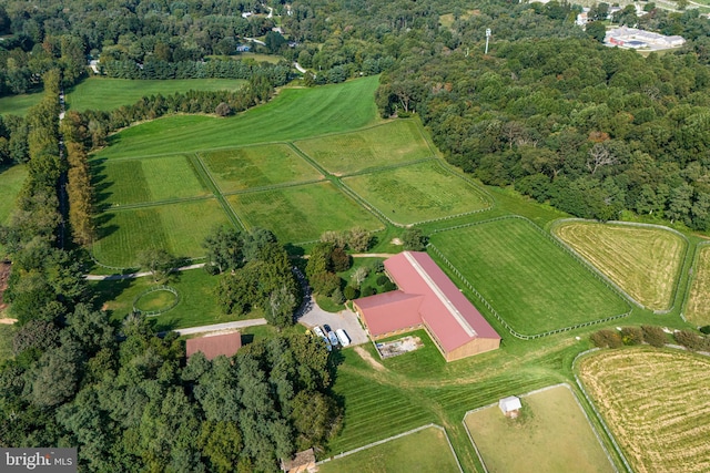 birds eye view of property featuring a rural view