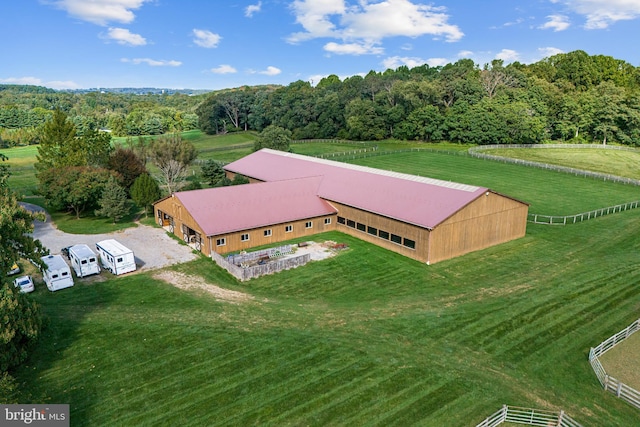 birds eye view of property featuring a rural view