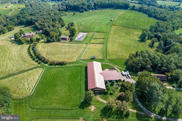 birds eye view of property featuring a rural view