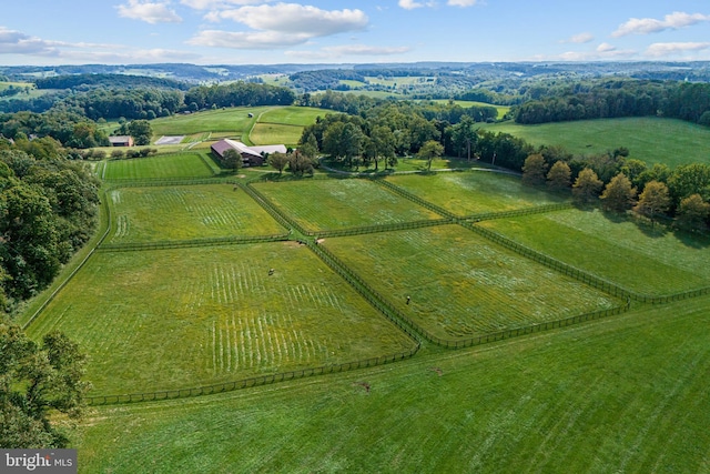 birds eye view of property featuring a rural view