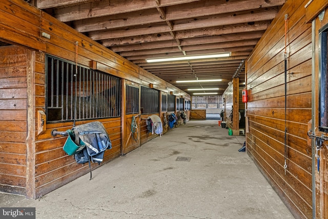 view of stable with an outdoor structure