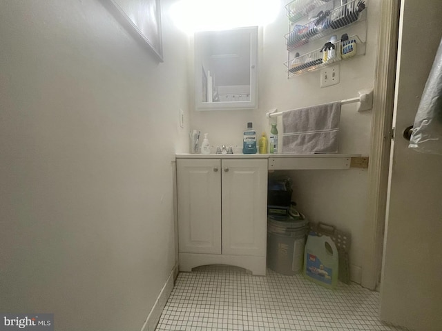 bathroom with tile floors