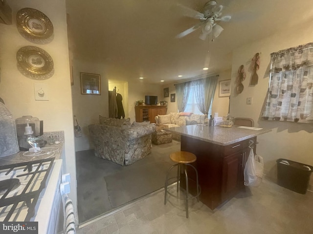 interior space featuring ceiling fan and light tile floors