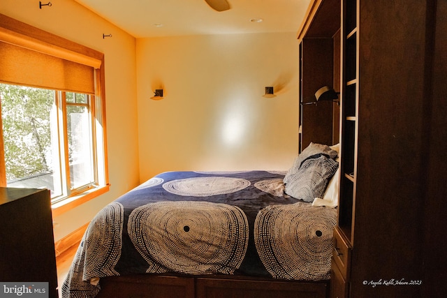 bedroom with wood-type flooring