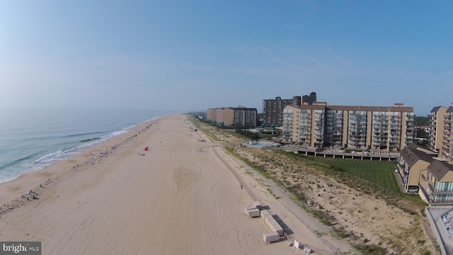 view of street with a water view and a view of the beach