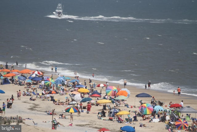 property view of water featuring a beach view