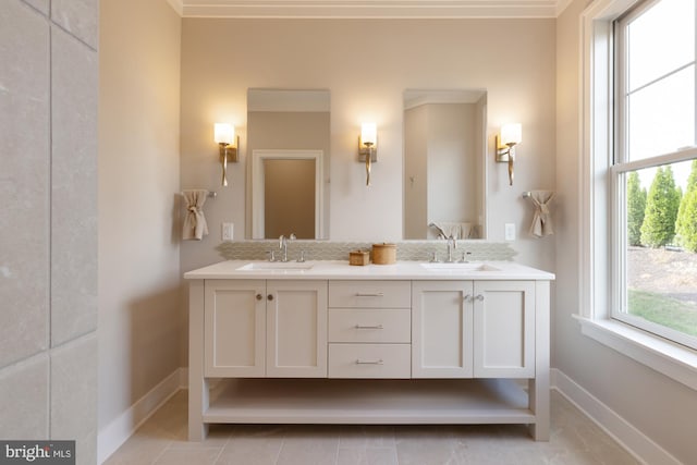 bathroom with tile floors, large vanity, and double sink