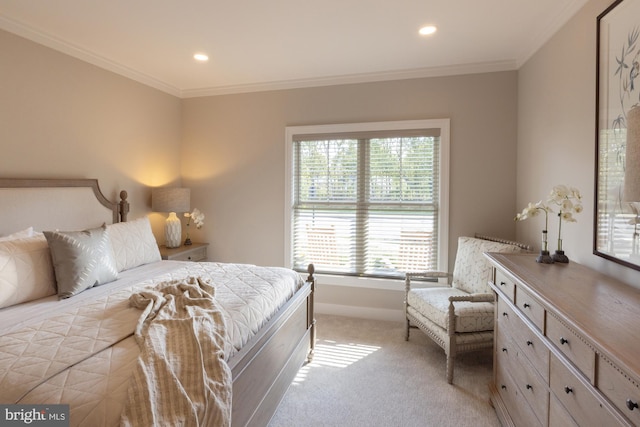 carpeted bedroom with access to outside and ornamental molding